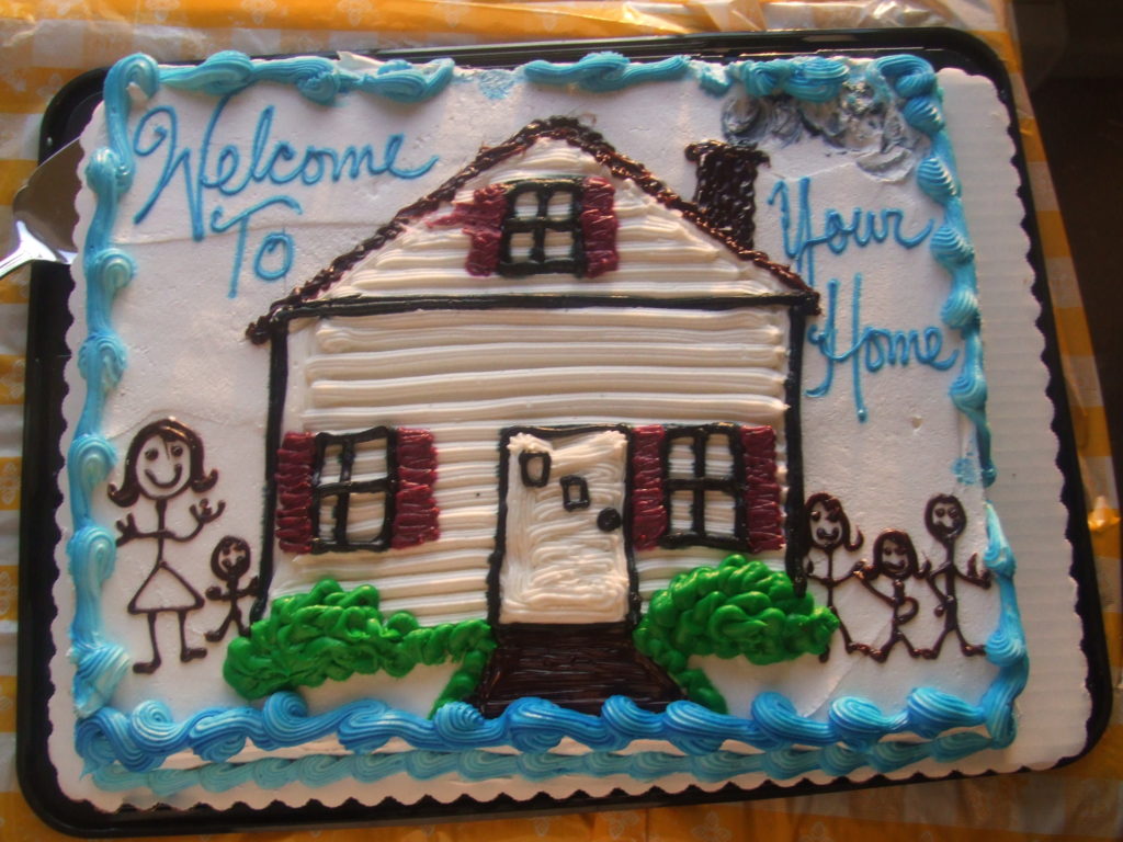 Cake with picture of house on it